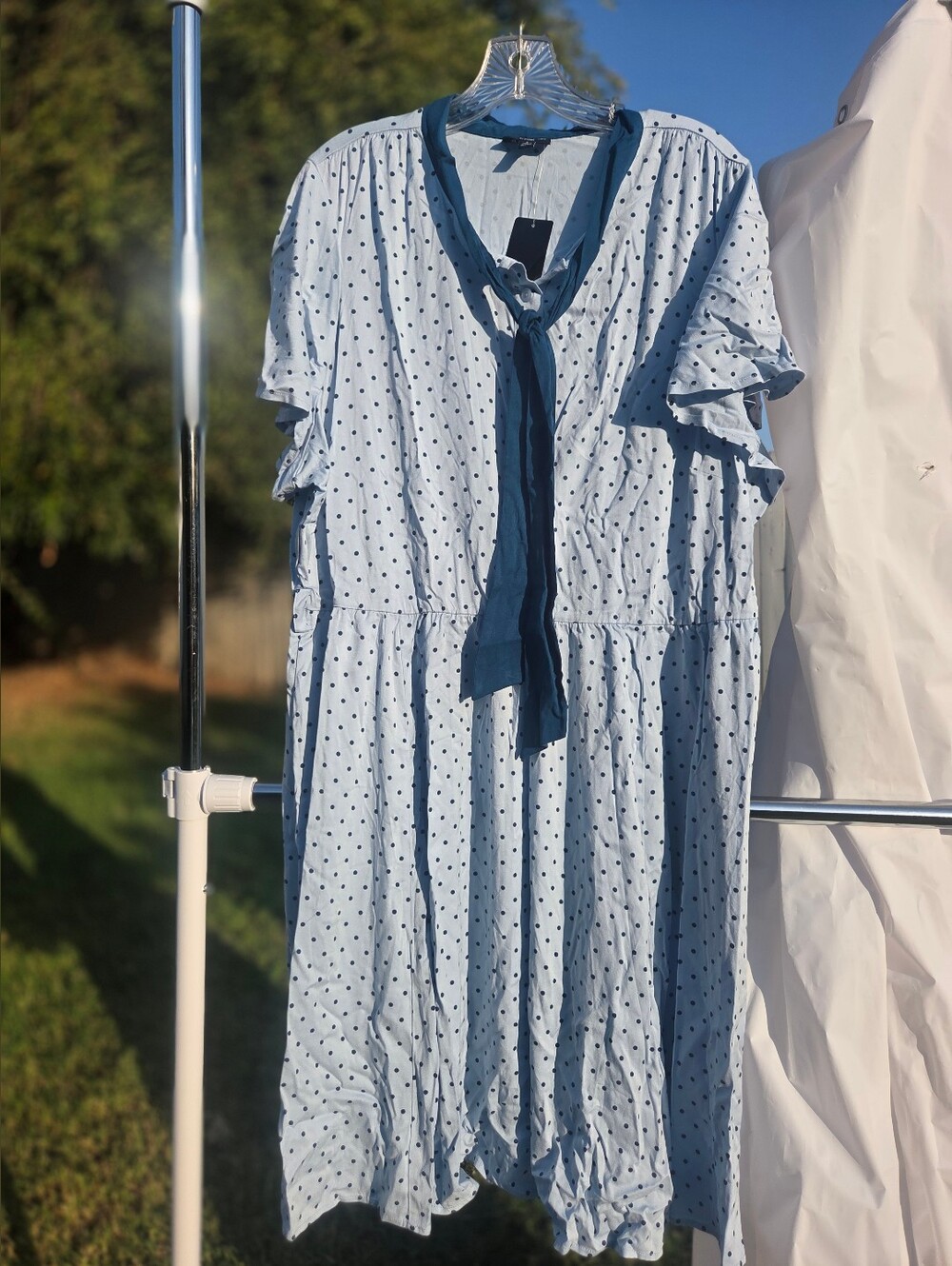 Light Blue Polka Dot Retro Chick Dress with Navy Tie Step into vintage-inspired